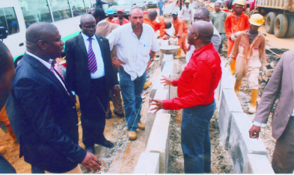 Rivers State Governor, Rt. Hon. Chibuike Amaechi (right) explaining a point during an inspection of projects under construction, recently.