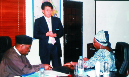 Head of South Korean business delegation to Rivers State, Mr Philip Yun (standing) making a presentation to management of Greater Port Harcourt City Development Authority (GPHCDA). With him are Ufot Ekaette, Minister of Niger Delta Affairs (left) and Administrator of GPHCDA, Dame Aleruchi Cookey-Gam, on Friday.