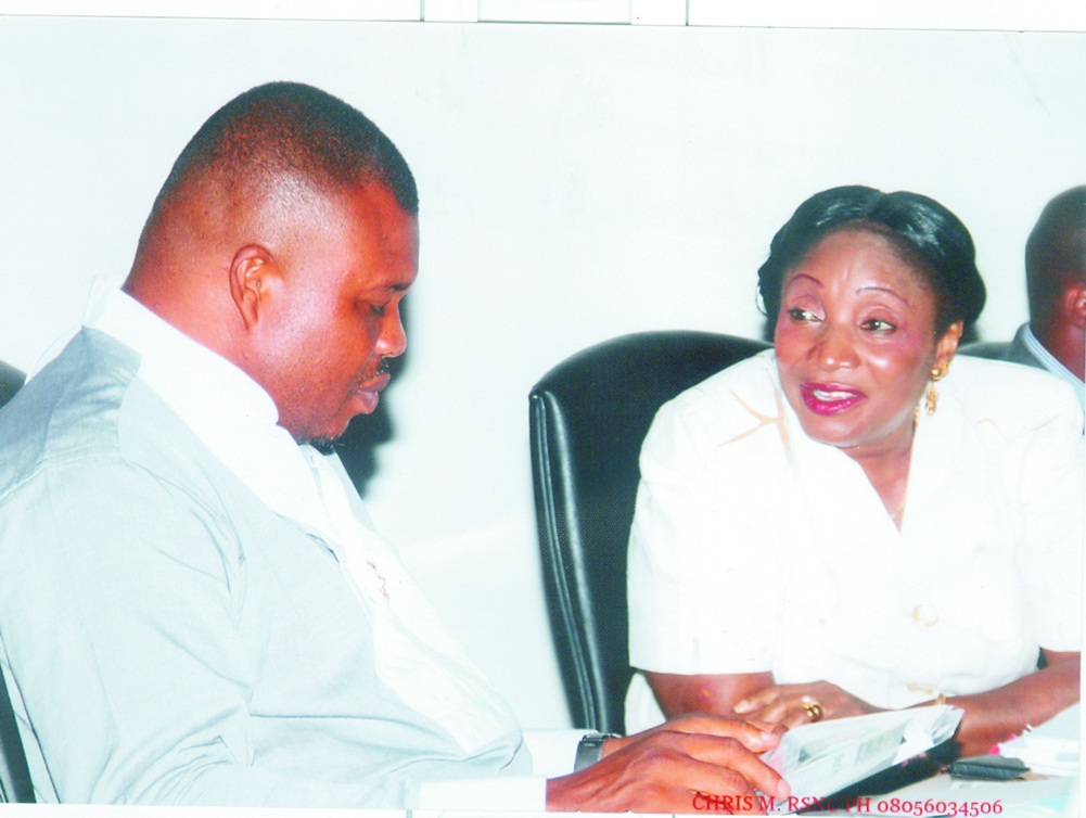 Hon Victor Ihunwo (left) conferring with Hon Irene Inimgba at the Rivers State House of Assembly Complex  Tuesday.