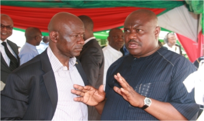 Director-General, Governor Chibuike Rotimi Amaechi’s Campaign Organisation, Chief Nyesom Wike (right) chatting with Rivers State Attorney-General and Commissioner for Justice, Barrister Ken Chikere, during the commissioning of the governor’s campaign secretariat, in Port Harcourt, on Tuesday.