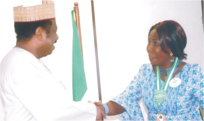 Hon Minister of State for Health, Alhaji Suleman Bello in a handshake with the District Governor, Lions Clubs International District 404A (Nigeria) Lion Dame Joy Peterba Warmate, when she paid a courtesy visit, in Abuja, recently.