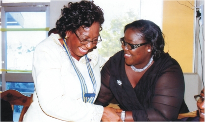 Rivers State Information and Communications Commissioner, Mrs Ibim Semenitari (right) chatting with Rotarian Georgiana Ngeri-Nwagha, immediate past President, Rotary Club of Port Harcourt, during  induction of the club’s  new president, on Saturday. Photo: Chris Monyanaga