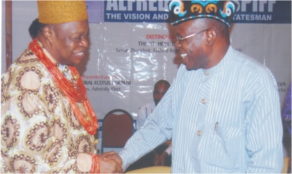 Eze Dr Chukumela Nnam Obi II, Oba of Ogbaland (left) in a handshake with former Military Governor of Rivers State, Group Capt Sam Ewang (rtd) during the presentation of the biography of former Military Administrator of Old Rivers State, King Alfred Diete-Spiff’s  in Port Harcourt, last Thursday. Photo Prince Dele Obinna