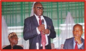 Chairman, Rivers State Civil Service Commission, Sir Ngo Martyns-Yellow (middle) speaking during the 2013 Civil Service Week/Awards day in Port Harcourt, yesterday. With him are the state Attorney-General and Commissioner for Justice, Barrister Nworgu Boms (right) and former Mayor of  Port Harcourt, Chief G.W Iroanwusi.    Photo: Prince Dele Obinna