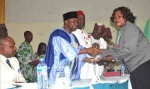 Vice President Namadi Sambo (2nd left), presenting an award to Executive Secretary, Benue State AIDS Control Agency, Mrs Grace Wende (right), at the 13th National Productivity Day celebration and Conferment of National Productivity Order of Merit award in Abuja, yesterday. With them are Chairman, National Productivity Order of Merit Award Committee, Dr Abbas Aidi (left), Minister of Labour and Productivity, Chief Emeka Wogu (3rd left) and Director-General, National Productivity Centre, Dr Paul Bdliya.