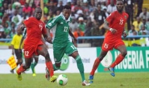 Super Eagles Nnamdi Oduamadi (12) taking Malawian opponent at the UJ Esuene Stadium, Calabar, last Saturday