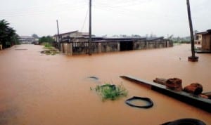 Submerged houses on Azinge Crescent, GRA, Benin City after a down pour recently