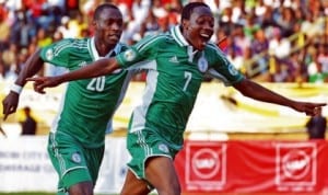 Super Eagles Ahmed Musa (7) and teammate celebrating a goal during the 2014 World Cup qualifiers.