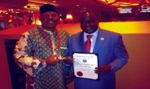 Mayor of Maryland and President of US Mayors' Conference, Dr James Walls (left), presenting an Award to Director General, NAFDAC,  Dr. Paul Orhii in Milwaukee, USA  recently. Photo: NAN