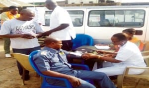 FRSC health officals screening drivers plying Onitsha-Owerri Road at Ihiala junction in Ihiala LGA of Anambra State, yesterday. Photo: NAN