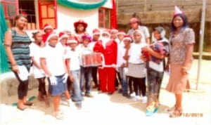 Proprietress, Diamond Stars International School, Rumuosi, Port Harcourt, Mrs Helen Uboka (middle), with members of the Christmas Carol Choir of the school, during the school’s end of term/year Christmas party, last Thursday.