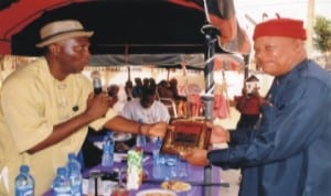 Former member, Rivers State House of  Assembly, Hon Chief B. K. Amadi (right), receiving an Award from the Secretary, Rebisi Council of Chiefs, Christopher Wonodi, during the sendforth ceremony of the body  at Ogbunabali Civic Centre, Port Harcourt, recently. Photo: Obinna Prince Dele