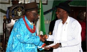 Rivers State Governor Rt. Hon. Chibuike Rotimi Amaechi (right) receiving an address from HRM King G. N. K. Gininwa,  Gbemene Tai, during a New Years visit to his palace in Tai on Wednesday.