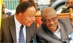 Secretary to Rivers State Government, Mr George Feyii (left), with the Head of Civil Service, Mr Samuel LongJohn, during the 2014 Rivers Civil Service Prayer session/dedication in Port Harcourt, Wednesday