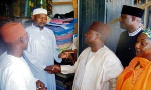 Senator representing Adamawa North Senatorial District of Adamawa State, Senator Bindow Jibrilla (3rd-right), with some traders, during his  visit to Mubi Central Market to console the traders over recent robbery attack tn the market last Thursday. Photo: NAN