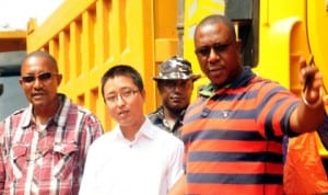 L-R:  Consultant,  Mr Greg Nnaji; Project Manager, CGC Nigeria Limited, Mr Li Hairjong And Enugu State Commissioner for Works, Mr Godwin Madueke, at the Launch of rehabilitation of new Market/Ngwo road in Enugu last Monday.