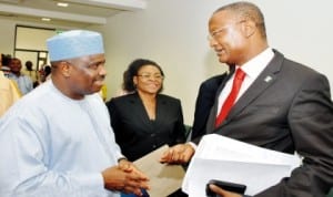 Speaker, House of Representatives, Aminu Tambuwal (left), discussing with the president general, Unity Schools Old Students Association (usosa), Mr Kabiru Koko, during the visit of the members  to the Speaker in Abuja, yesterday. With them is Rep. Stella Ngwu. Photo: NAN