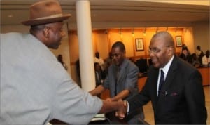 Rivers State Governor, Rt Hon Chibuike Rotimi Amaechi (left) congratulating the new Rivers State Chief Judge, His Lordship, Peter Agumagu, shortly after the swearin-in of the new chief judge  at Government House, Port Harcourt, yesterday.