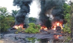 Illegal refineries being destroyed by Naval officers in Warri, yesterday