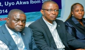 L-R: Vice President, National Institute of Estate Surveyors and Valuers, Mr James Emelu, President, Emeka Eneh and former Treasurer, Mrs Linda Ajayi, at the National Institute of Estate Surveyors and Valuers Conference in Uyo recently. Photo: NAN