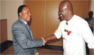 Secretary to the State Government, Mr. George Feyii (left), congratulates Mr. Benjamin Orugbani, shortly after his inauguration as Chairman, Rivers State Scholarship Board at Government House, Port Harcourt.