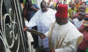 National Chairman of APGA, Chief Victor Umeh (right), during his visit to Late Odumegwu Ojukwu's cenotaph in Nnewi last Thursday . With him is the son of Late Ojukwu, Chief Emeka Ojukwu Jr.