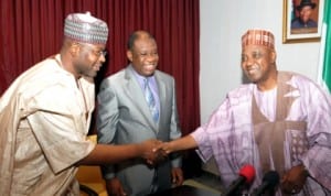 Vice President Namadi Sambo (right), in a handshake with the Minister of State for Power, Mohammed Wakil (left), during a courtesy visit by North South Power Limited executives in Abuja recently. With them is the Minister of Power, Prof. Chinedu Nebo. 