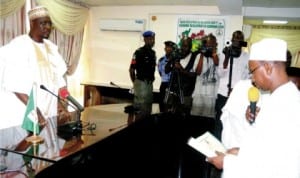 Newly appointed Secretary to Adamawa State Government, Prof. Liman Tukur (right), taking oath of office before the Acting Governor, Alhaji Ahmadu Umaru in Yola, last Wednesday.