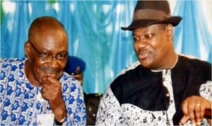 Rivers State Deputy Governor, Engr Tele Ikuru (right) chatting with the Head of Service, Rivers State, Barrister Samuel T LongJohn at the 2014 Civil Service Week celebration in Port Harcourt, Monday