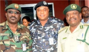 L-R: Commander, 2 Brigade, Nigerian Army, Brig.-Gen Osasogie Uzamere, Commissioner of Police, Rivers, Mr Tunde Ogunsakin  and Controller of Prison, Rivers,Mr Patrick Ondoma, during Inter-Agency Consultative Committee meeting on Election Security in Port Harcourt, yesterday . 