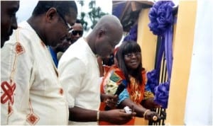 Rivers State Commissioner for Information and Communications, Mrs Ibim Semenitari, commissioning the water project built by her  in Okrika last Friday. With her are Rivers Deputy Chairman, All Progressives Congress, Prince Peter Odike (left) and other personalities. Photo: Chris Monyanaga