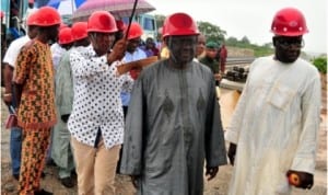 Chairman, Subsidy Re-Investment and Empowerment Programme (SURE-P), Retired Gen. Martin Lurther-Agwai (2nd right), inspecting the Light Rail Project in Abuja last Friday. With him is the Coordinator, SURE-P Operations, Mr Ali Fatoma.