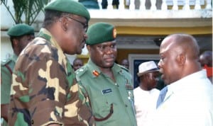 Chief of Army Staff, Lt General Kenneth Minimah (middle) with Brigade Commander, Bori Camp, Port Harcourt, Brig-General Osadogie Uzamere (left) and Assistant Controller General of Customs, Mr Abonh Monday at the palace of Gbenemene of Tai, during a courtesy visit recently. Photo: ChrisMonyanaga