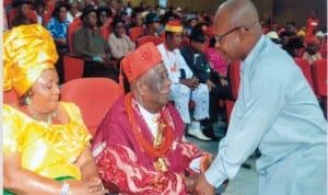 Rivers State Commissioner for Chieftaincy and Community Affairs, Hon Charles Okaye (right), exchanging pleasantries with  Chairman, Rivers State Council of Traditional Rulers, Gbenemene Tai, King Godwin Gininwa (middle) and his wife, Queen Grace, during a thanksgiving service at Dr Obi Wali International Convention Centre in Port Harcourt, last Saturday.