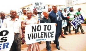 Founder, Igbo Youth Movement (IYM), Comrade Elliot Uko (left), with members of IYM and South-East Self Determination Coalition on a peaceful rally on violence free 2015 elections in Enugu recently.           Photo: NAN