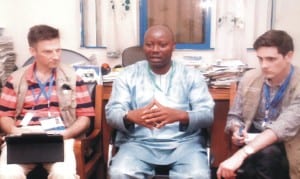 Rivers State NUJ Chairman, Mr Opaka Dokubo (middle) explaining some points to foreign election observers who visited him in his office  in Port Harcourt last Friday.            Photo: Egberi A. Sampson