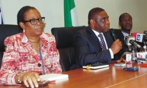 L-R: Head, Legal and Regulatory Department, Nigerian Communications commission, Mrs Yetunde Akinloye, Director,  Public Affairs, Mr Tony Ojobo and Director, Spectrum Administration, Rev. Nwaulune Augustine, at the  ncc news conference on the 2.6ghz frequency spectrums inAbuja, recently. Photo: NAN