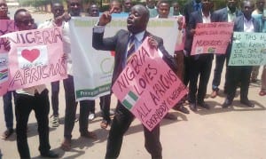 Executive Director of the Citizens Advocacy for Social and Economic Rights (CASER), Mr Frank Tietie and other members of the group, during a protest  at the South African High Commission over the xenophobic attacks on Nigerians and other African nationals in South Africa, in Abuja, yesterday