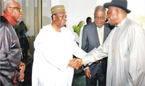 President Goodluck Jonathan (right) in handshake with former Head of State, Gen. Yakubu Gowon, at the Presidential Prayer Breakfast in Abuja last Saturday. With them are, former Head of Interim National Government, Chief Ernest Shonekan (2right) and the President, Christian Association of Nigeria (CAN), Pastor Ayo Oritsejafor.