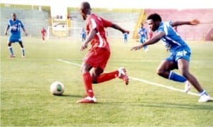 Dolphins FC’s player (right) trying to close down on opponent in a recent league match at the Liberation Stadium, Port Harcourt