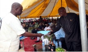 Rivers State Governor, Chief Nyesom Wike (right), receiving an address from the Chairman of SPAT Limited, Mr Maxwell Anuonye, during the grand breaking of the SPATMART Centre, in Port Harcourt.