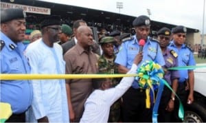 Rivers State Governor, Chief Nyesom  Wike (3rd left), watching as the Inspector General of Police, Mr. Solomon Arase (3rd  right), commissioned  64 patrol utility security vans for the police and other security agencies in Rivers State, in Port Harcourt, yesterday