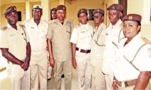 Newly promoted officers of the Nigeria Immigration Service, Bayelsa State Command, after their decoration in Yenagoa on Tuesday.      Photo: NAN