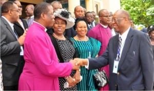 Archbishop, Metropolitan and Primate of All Nigeria, Most Revd Nicholas Okoh (2nd left), in handshake with the former Governor Edo State, Prof.  Osareme Osunbor (right), at the Conference of Chancellors, Registrars and Legal Officers in Abuja, yesterday 