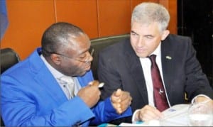 Permanent Secretary, Ministry of Water resource, Mr Musa Istifanus (left),  discussing with the keynote speaker, Mr Raanan Adin, at the 2015 WAIEC Exhibition  and Conference in Abuja recently.