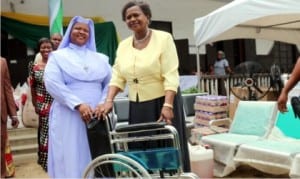 Rivers State Deputy Governor, Dr. Ipalibo Harry Banigo (right), presenting some gift items to Rev. Sister, Jane Raphael, during a charity visit to the Home for the Elderly at Harbour Road, Port Harcourt, on Friday.