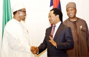 President Muhammadu Buhari (left), in a handshake with Senator Shehu Sani (2nd right), during a presidential dinner in honour of Senators  at thePresidential Villa in Abuja on Wednesday. With them is Senate President, Bukola Saraki.