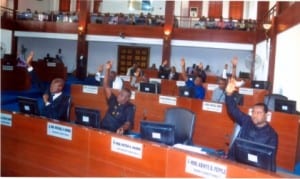 Rivers State lawmakers voting to pass the N104.2 billion Supplementary Budget in Port Harcourt, yesterday.