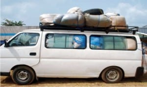 A overloaded bus with smuggled second hand clothings impounded by Nigerian Customs Service in Owerri on Monday .