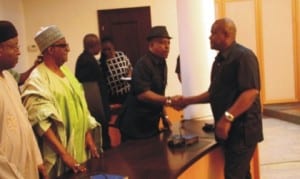 Rivers State Governor, Chief, Nyesom Ezenwo Wike (right),   in a handshake with Acting National Chairman of PDP, Prince Uche Secondus (middle), during a congratulatory  visit to Governor Wike at the Government House, Port Harcourt, yesterday. With them is Secretary of the Board of Trustees of PDP, Senator Jubril Wahlid (2nd left)